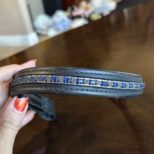 POH brownband with blue stones.